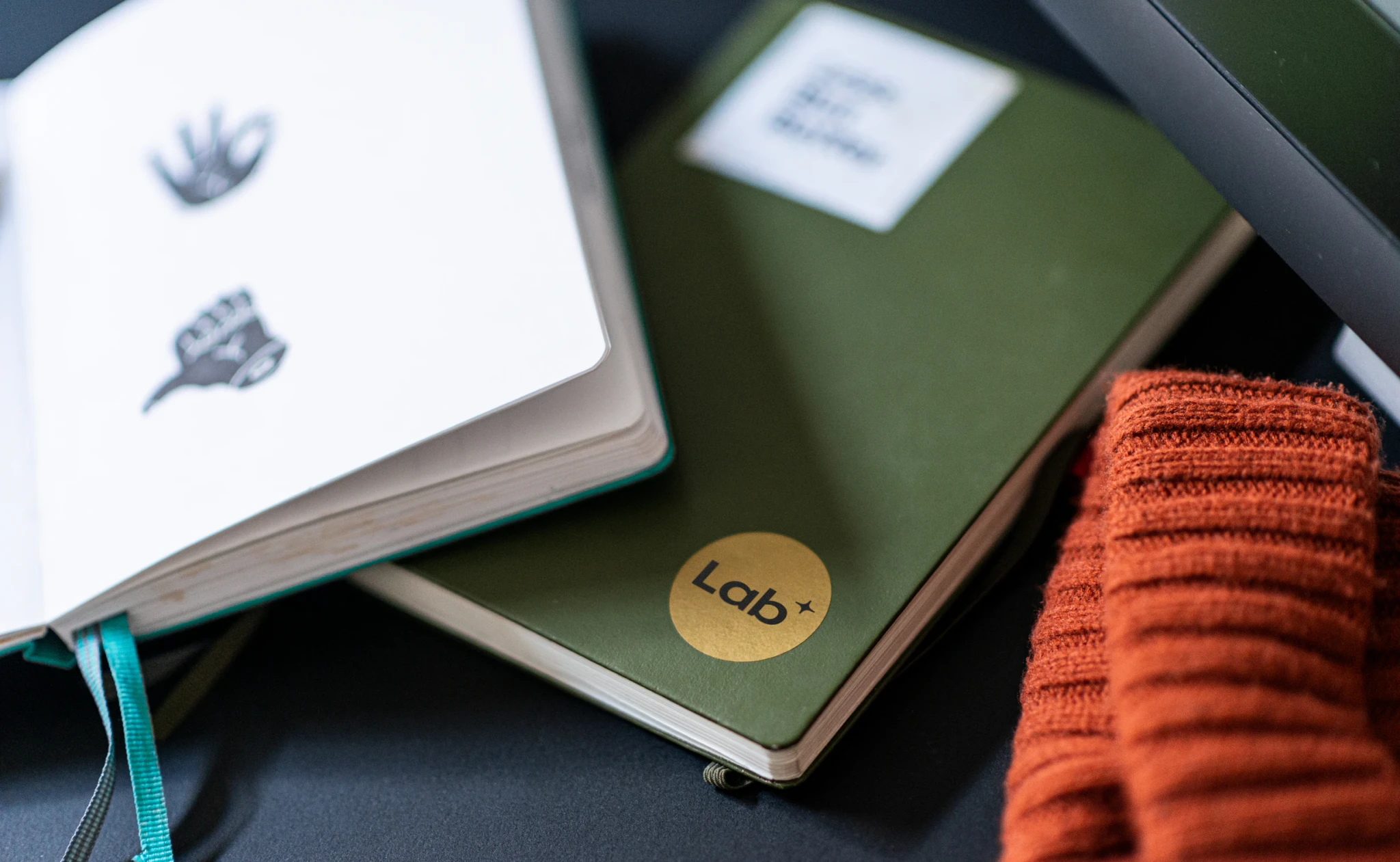 Notebooks with a Lab sticker
