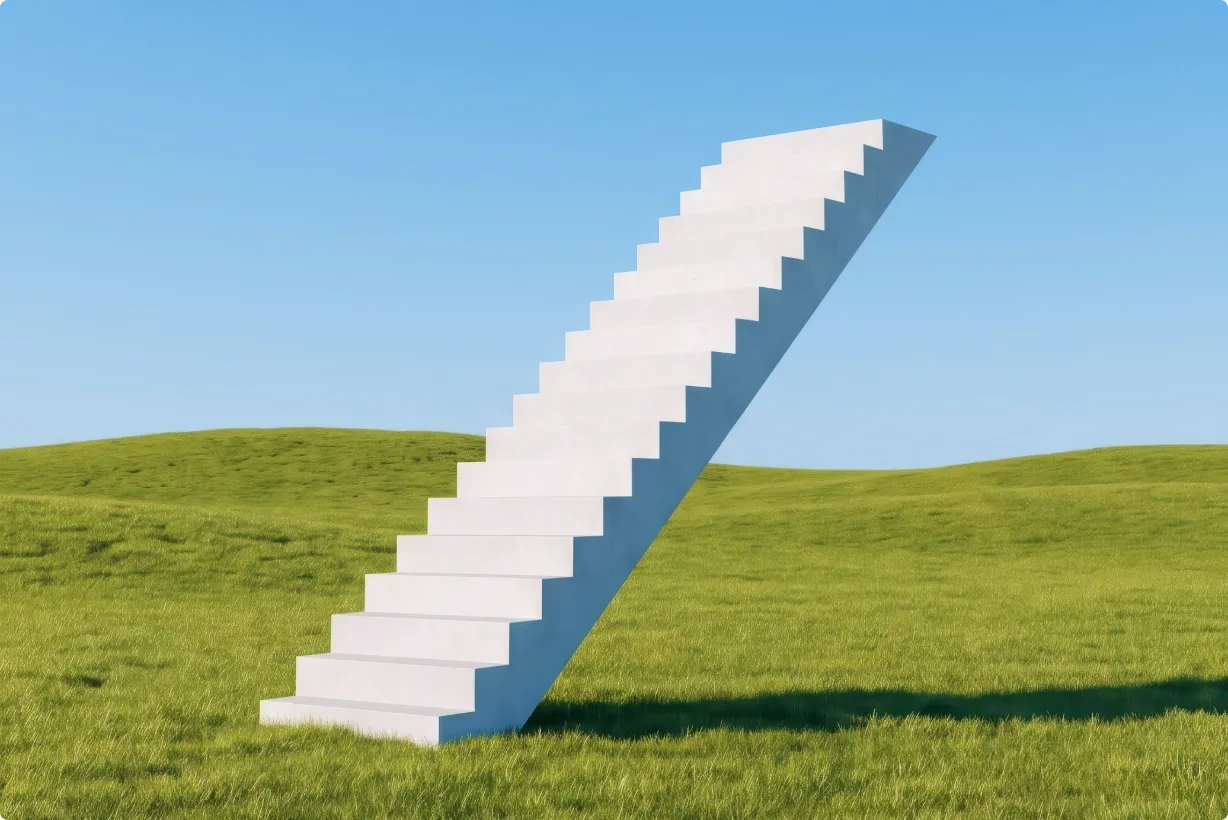 A white staircase rising out of a green meadow